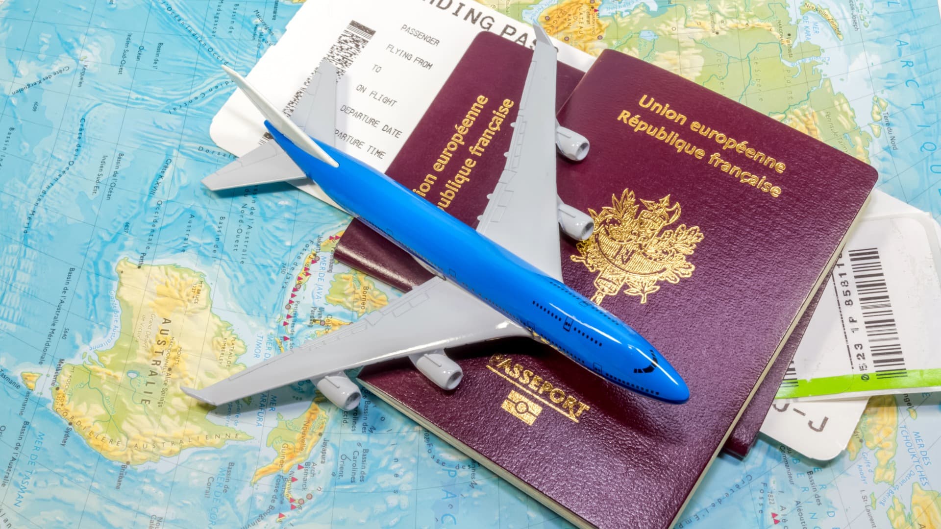 Passports, airplane and boarding passes as a symbol of visa and moving to China